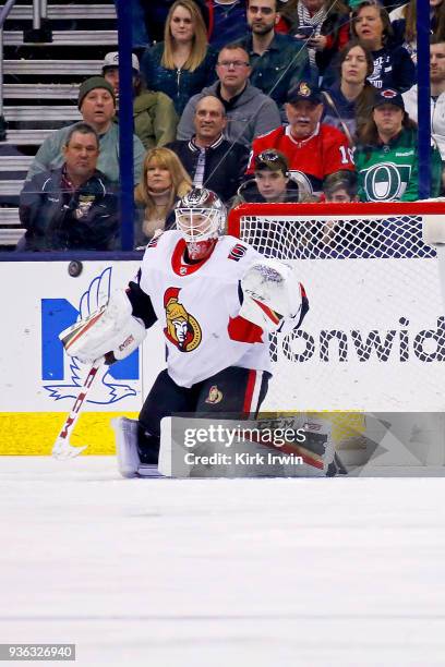 Mike Condon of the Ottawa Senators follows the puck during the game against the Columbus Blue Jackets on March 17, 2018 at Nationwide Arena in...