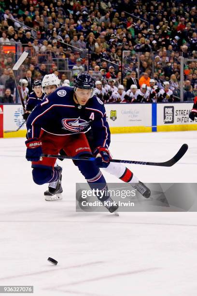 Jack Johnson of the Columbus Blue Jackets skates after the puck during the game against the Ottawa Senators on March 17, 2018 at Nationwide Arena in...