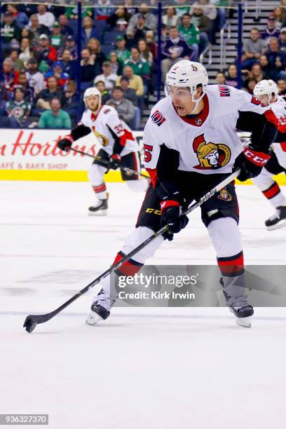 Cody Ceci of the Ottawa Senators controls the puck during the game against the Columbus Blue Jackets on March 17, 2018 at Nationwide Arena in...