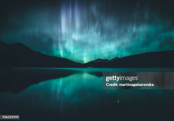 northern lights over lake, jasper, alberta, canada - canada landscape ストックフォトと画像