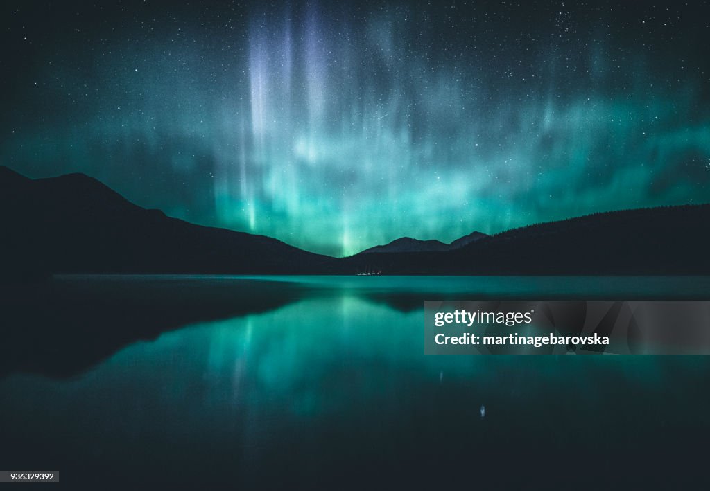 Northern lights over lake, Jasper, Alberta, Canada