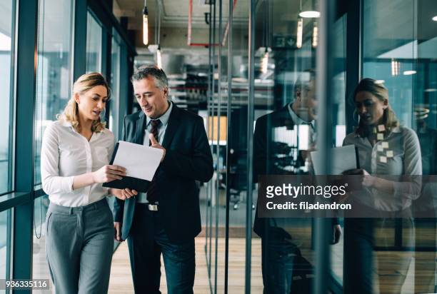 entrepreneur meeting young businesswoman - writing copy stock pictures, royalty-free photos & images