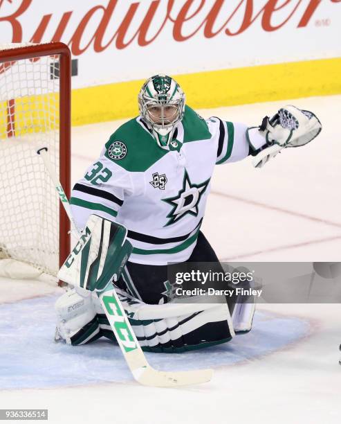 Goaltender Kari Lehtonen of the Dallas Stars guards the net during first period action against the Winnipeg Jets at the Bell MTS Place on March 18,...