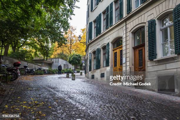 cobblestone road leading up to lindenhof park zurich - stone pavement stock pictures, royalty-free photos & images