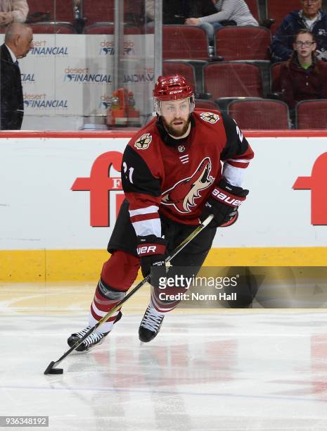 Derek Stepan of the Arizona Coyotes skates with the puck against the Calgary Flames at Gila River Arena on March 19, 2018 in Glendale, Arizona.