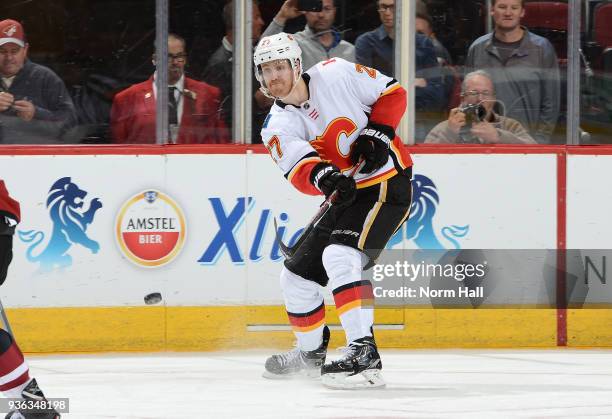 Dougie Hamilton of the Calgary Flames passes the puck against the Arizona Coyotes at Gila River Arena on March 19, 2018 in Glendale, Arizona.