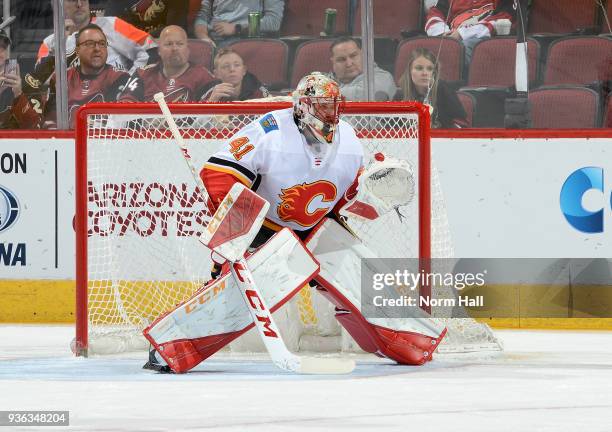 Mike Smith of the Calgary Flames gets ready to make a save against the Arizona Coyotes at Gila River Arena on March 19, 2018 in Glendale, Arizona.