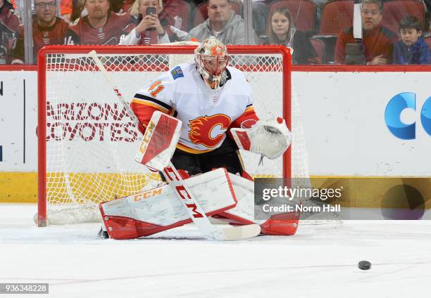 Mike Smith of the Calgary Flames gets ready to make a save against the Arizona Coyotes at Gila River Arena on March 19, 2018 in Glendale, Arizona.