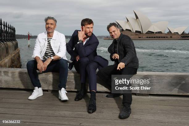 Taika Waititi, Chris Hemsworth and Mark Ruffalo pose in front of the iconic Sydney Opera House. They are in Sydney promoting their film Thor:...