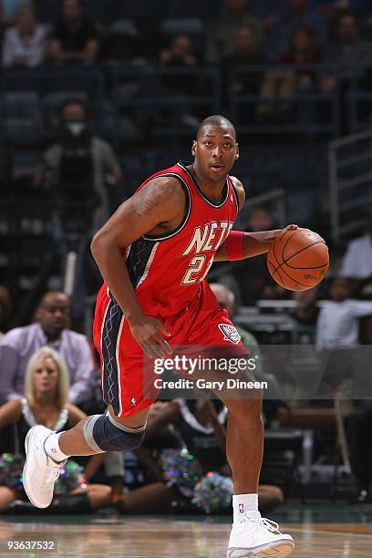 Bobby Simmons of the New Jersey Nets moves the ball against the Milwaukee Bucks during the game on November 18, 2009 at the Bradley Center in...