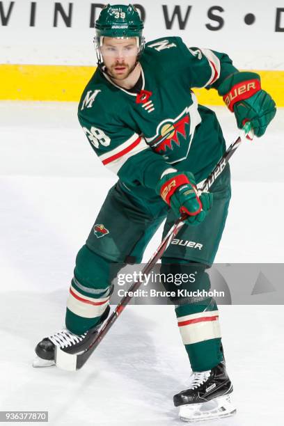 Nate Prosser of the Minnesota Wild passes the puck against the Colorado Avalanche during the game at the Xcel Energy Center on March 13, 2018 in St....