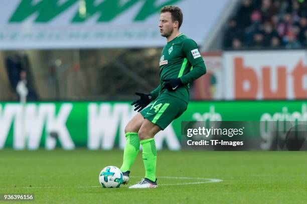 Philipp Bargfrede of Bremen controls the ball during the Bundesliga match between FC Augsburg and SV Werder Bremen at WWK-Arena on March 17, 2018 in...