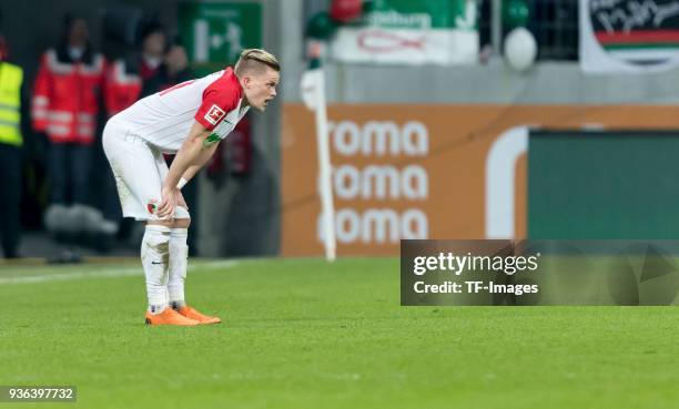 Philipp Max of Augsburg reacts during the Bundesliga match between FC Augsburg and SV Werder Bremen at WWK-Arena on March 17, 2018 in Augsburg,...