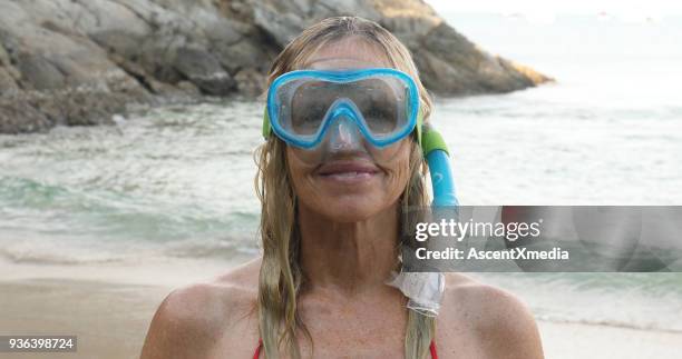 portrait of snorkeler on beach smiling. - funny hobbies stock pictures, royalty-free photos & images