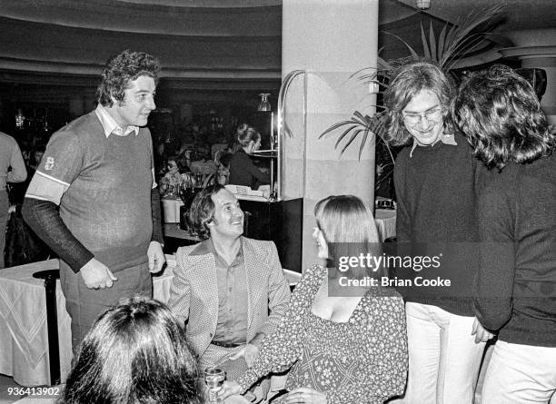 Unknown, Neil Sedaka, unknown and Ray Davies of The Kinks photographed at a reception for The Pointer Sisters at the Biba Restaurant in Kensington,...