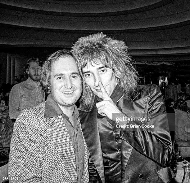 Neil Sedaka and Rod Stewart photographed at a reception for The Pointer Sisters at the Biba Restaurant in Kensington, London on 10th January 1974.