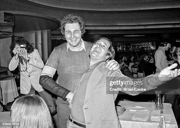 Unknown with Neil Sedaka photographed at a reception for The Pointer Sisters at the Biba Restaurant in Kensington, London on 10th January 1974.