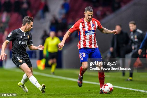 Victor Vitolo of Atletico de Madrid in action against Sebastien Corchia of Sevilla FC during the Copa del Rey 2017-18 match between Atletico de...