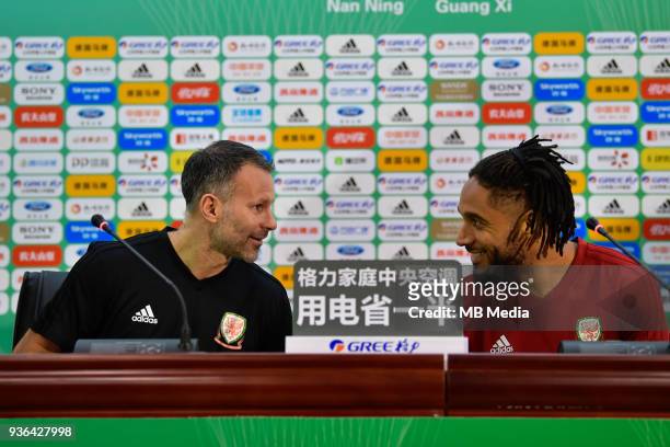 Ashley Williams, right, and head coach Ryan Giggs of Wales national football team attend a press conference before the semi-final match against China...