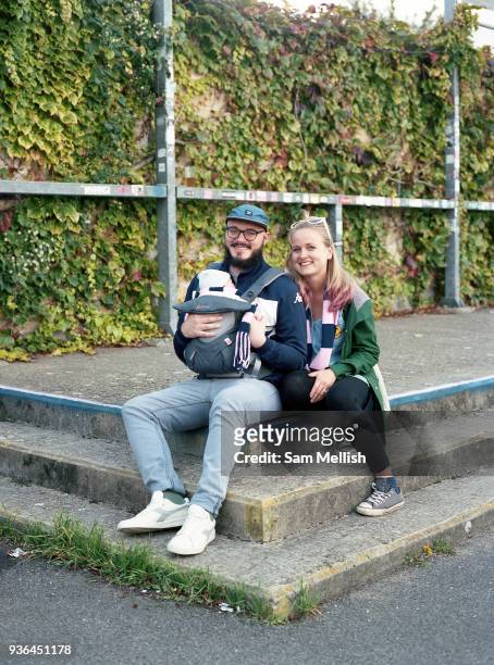Young family ahead of the Dulwich Hamlet FC vs Sierra Leone, charity game, at Champion Hill on 17th September 2017 in South London in the United...