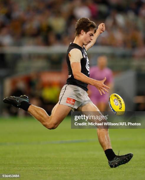 Debutant, Paddy Dow of the Blues kicks the ball during the 2018 AFL round 01 match between the Richmond Tigers and the Carlton Blues at the Melbourne...