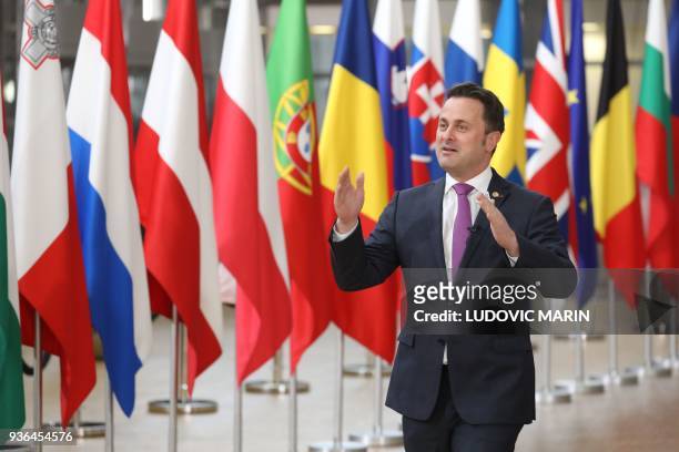 Luxembourg's Prime minister Xavier Bettel arrives on the first day of a summit of European Union leaders at the EU headquarters in Brussels, on March...