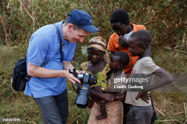 European photographer in Uganda. Uganda.