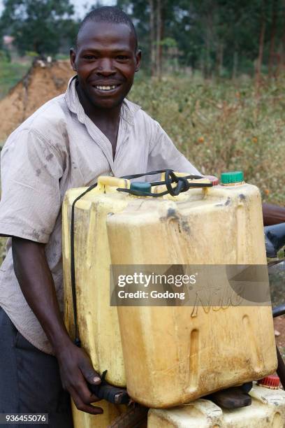 Fetching water in Masindi, Uganda. Uganda.