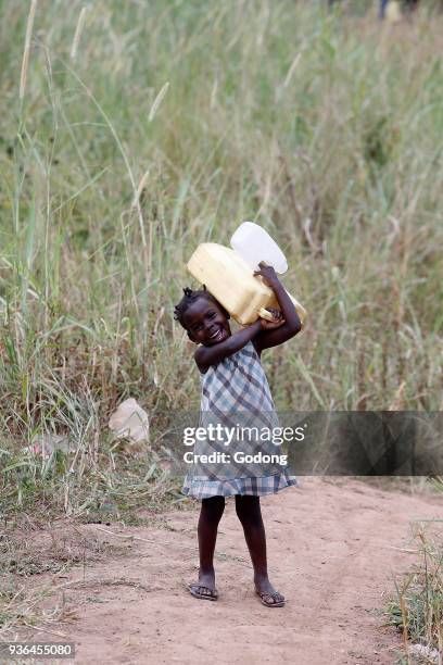 Fetching water in Masindi, Uganda. Uganda.