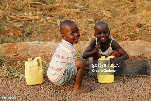 Fetching water in Masindi, Uganda. Uganda.