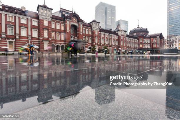 tokyo city in the rain at day time. - tokyo station stock pictures, royalty-free photos & images