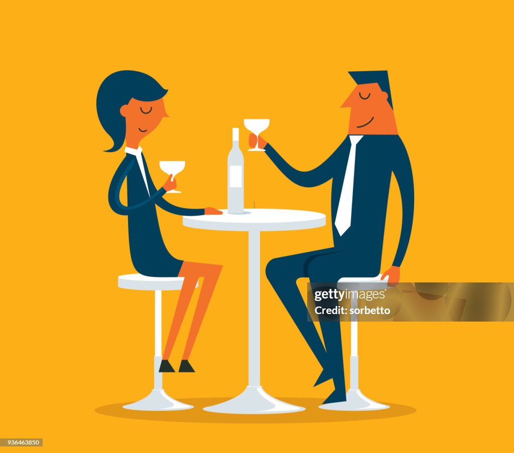 Businessman and Businesswoman in pub