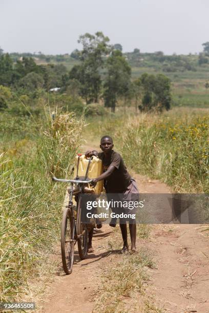 Water chore. Uganda.