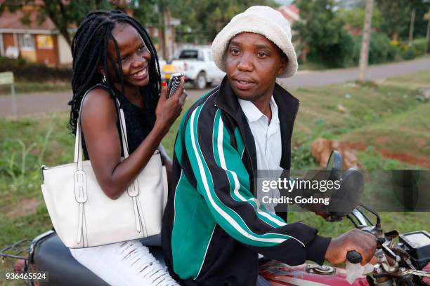 Ugandan woman on a boda boda . Uganda.