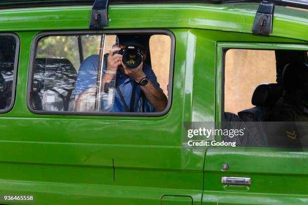 Tourist in Ziwa national park. Uganda.