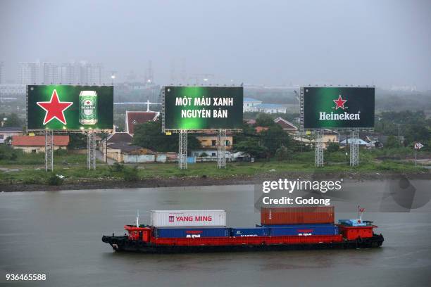 Vietnam, Ho Chi Minh City, ship on Saigon River during Heavy Monsoon Rain. Ho Chi Minh City. Vietnam.