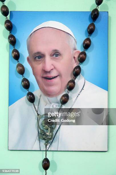 Picture of Pope Francis with holly rosary beads. Ho chi Minh City. Vietnam.