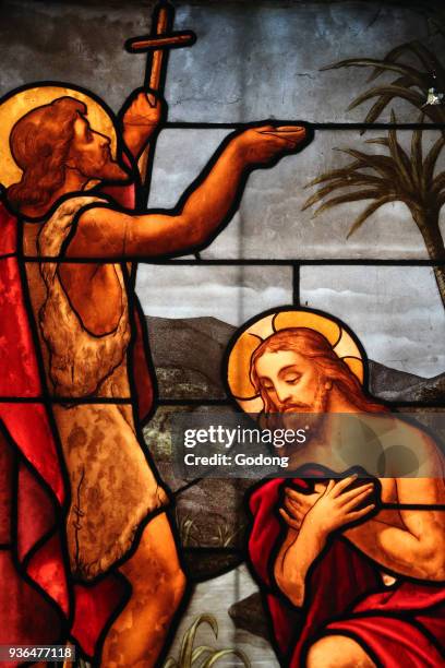 Ho Chi Minh city. Notre-Dame Cathedral Basilica of Saigon. Stained glass window. Baptism of Christ. Ho chi Minh City. Vietnam.