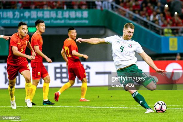 Sam Vokes of Wales shoots the ball during the 2018 China Cup International Football Championship match between China and Wales at Guangxi Sports...