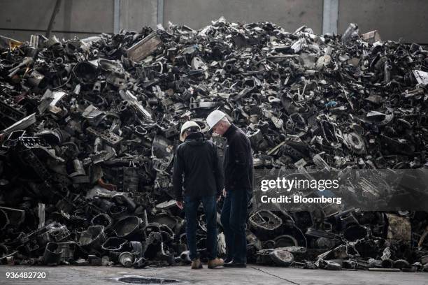 Scrap metal sits in a pile in the storage warehouse at the Alumetal Group Hungary Kft. Aluminium processing plant in Komarom, Hungary on Monday,...