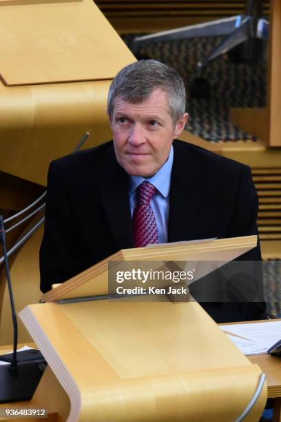 Scottish Liberal Democrat leader Willie Rennie takes his seat for First Minister's Questions in the Scottish Parliament, on March 22, 2018 in...