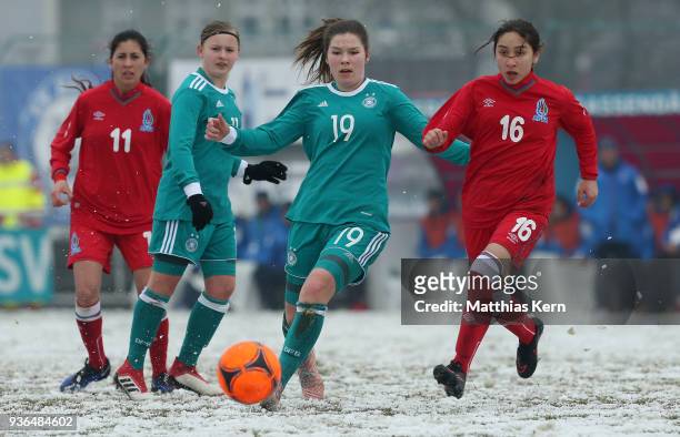 Pauline Berning of Germany battles for the ball with Umnisa Aliyeva of Azerbaijan during the UEFA U17 Girl's European Championship Qualifier match...