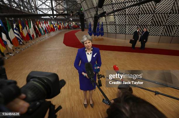 British Prime Minister, Theresa May speaks to the media as she arrives at the Council of the European Union for the first day of the European Council...