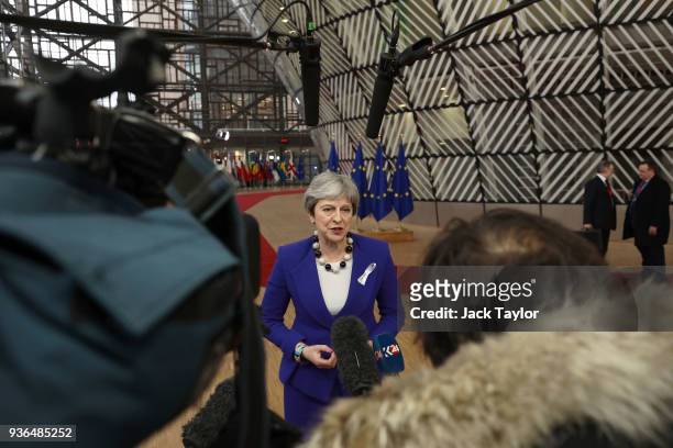 British Prime Minister, Theresa May speaks to the media as she arrives at the Council of the European Union for the first day of the European Council...