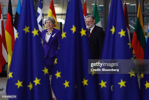 Theresa May, U.K. Prime minister, left, and Tim Barrow, U.K. Permanent representative to the European Union , arrive for a summit of European Union...