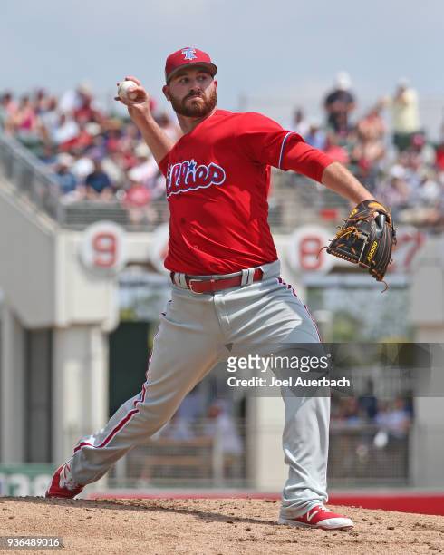 Drew Hutchison of the Philadelphia Phillies throws the ball against the Boston Red Sox during a spring training game at JetBlue Park on March 19,...