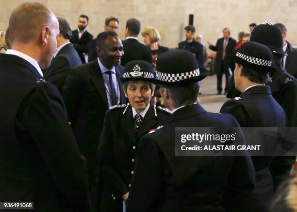 Metropolitan Police Commissioner Cressida Dick talks to colleagues after a commemorative event of prayer and reflection for the victims of the attack...