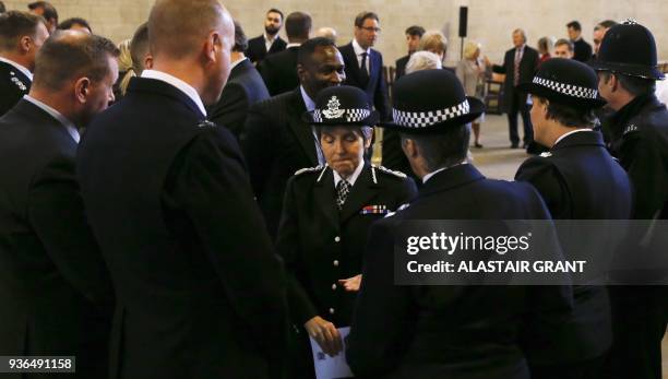 Metropolitan Police Commissioner Cressida Dick talks to colleagues after a commemorative event of prayer and reflection for the victims of the attack...