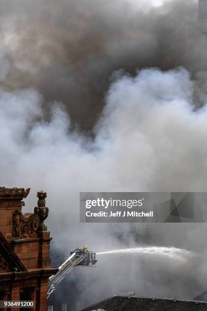Fire crews continue to tackle a blaze, which is believed to have started in Victoria's night club in Sauchiehall Street on March 22, 2018 in Glasgow,...