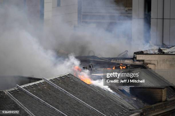 Fire crews continue to tackle a blaze, which is believed to have started in Victoria's night club in Sauchiehall Street on March 22, 2018 in Glasgow,...